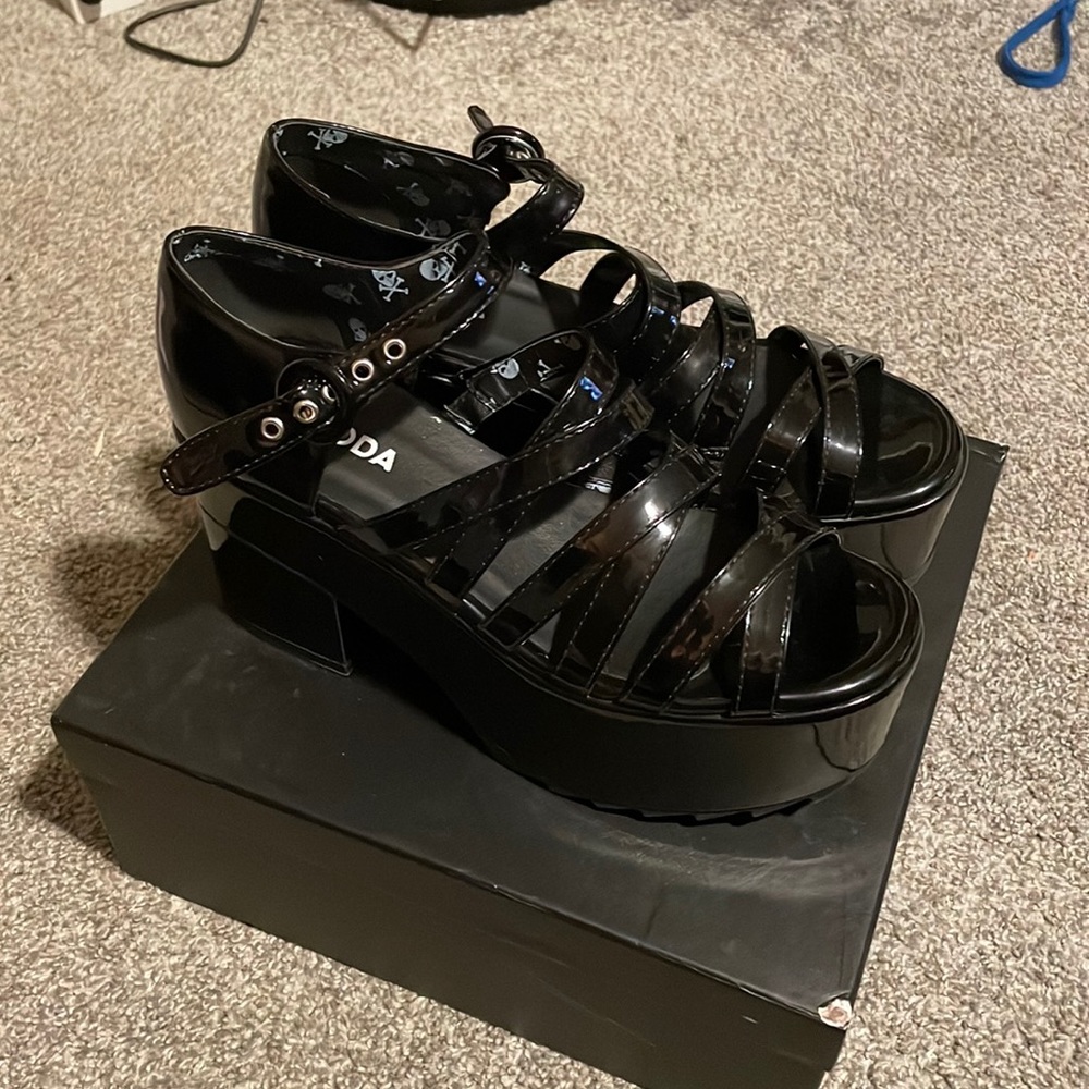 A pair of new lamoda black platform sandals